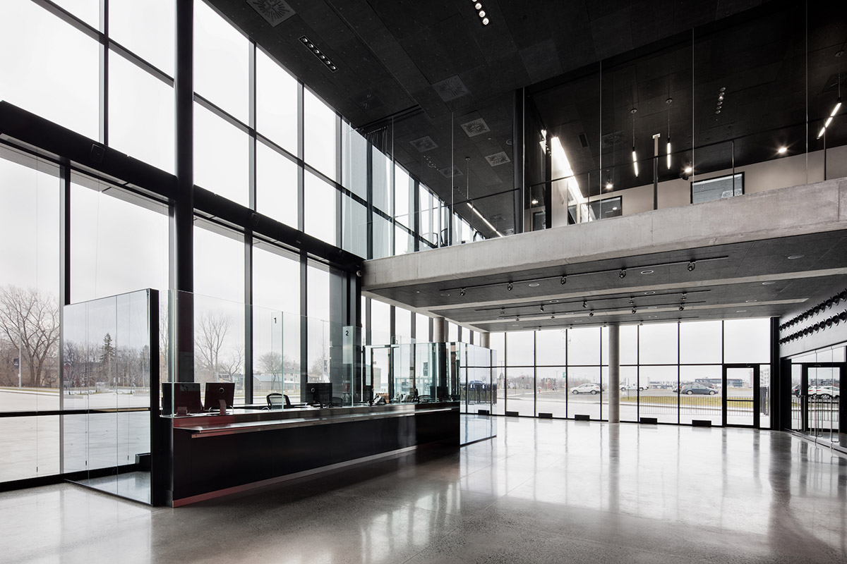 Paul Laurendeau completes outdoor summer amphitheater in Quebec with bold red floating roof