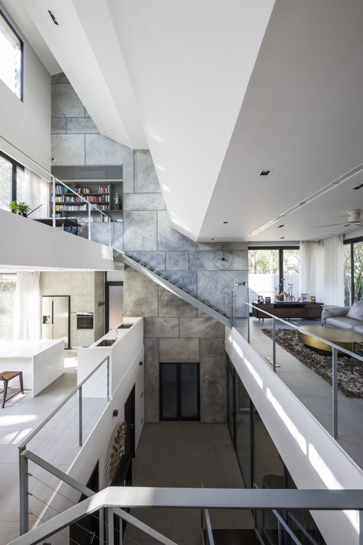 Nha Dan Architects built this house with porous facade to provide maximum thermal comfort in Vietnam