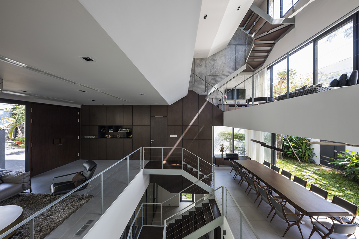 Nha Dan Architects built this house with porous facade to provide maximum thermal comfort in Vietnam