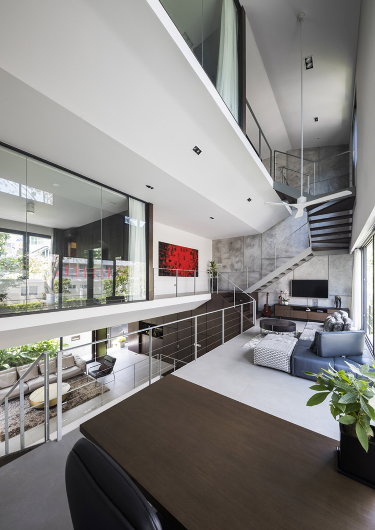 Nha Dan Architects built this house with porous facade to provide maximum thermal comfort in Vietnam