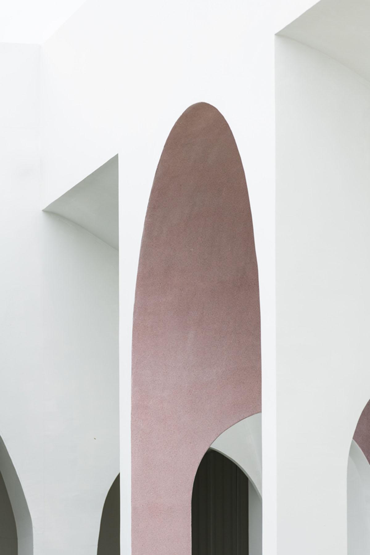 PHTAA creates flexible wedding venue with half-arch modular elements and white curved walls