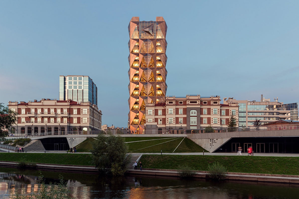 Foster + Partners completes office tower clad by triangular pieces of copper in Yekaterinburg