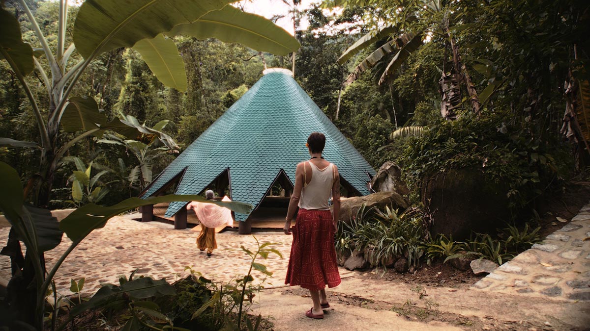 Birds' wings inform bamboo temple nestled in the Brazilian forest