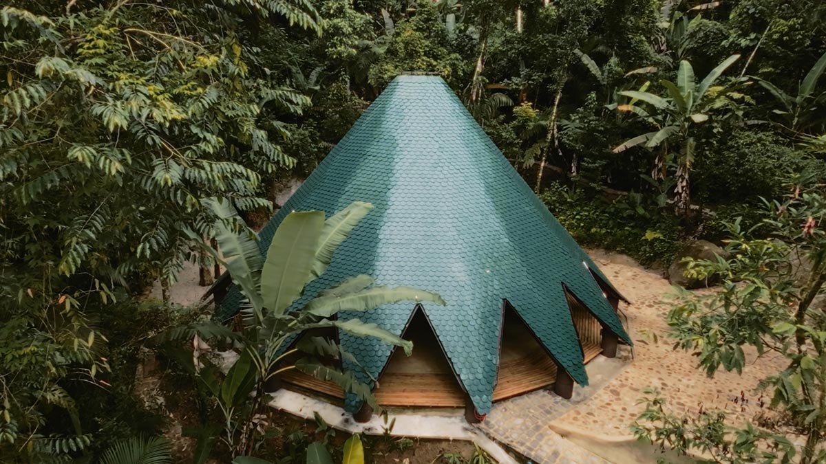 Birds' wings inform bamboo temple nestled in the Brazilian forest
