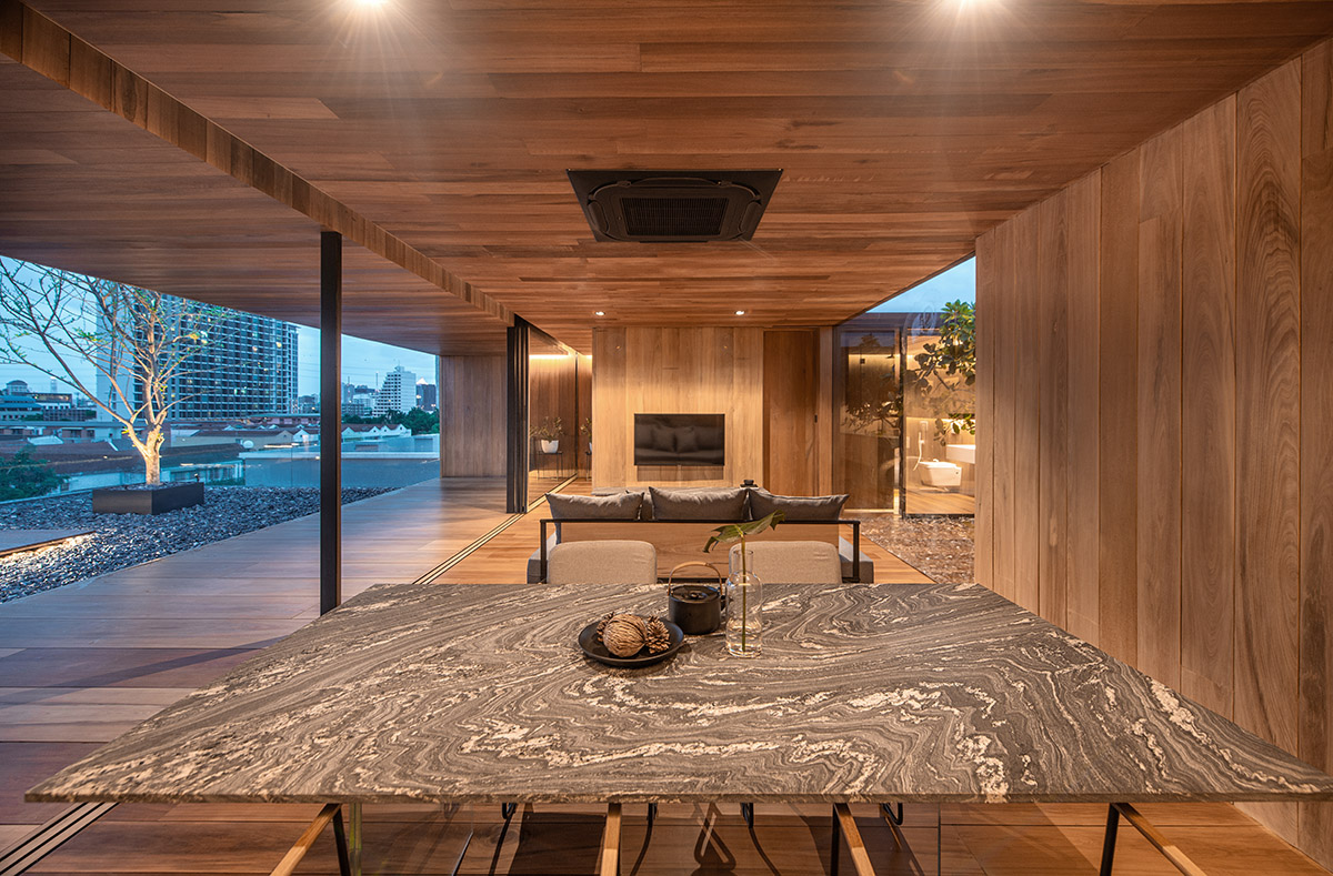 WARchitect built a borderless wooden residence on rooftop in Bangkok