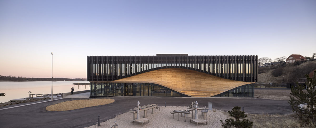 3XN Architects and SLA Architects complete Klimatorium featuring wooden wave in Denmark
