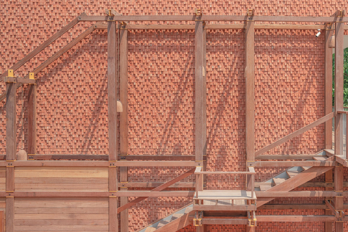 onion designs hotel and restaurant with handmade orange bricks in Thailand
