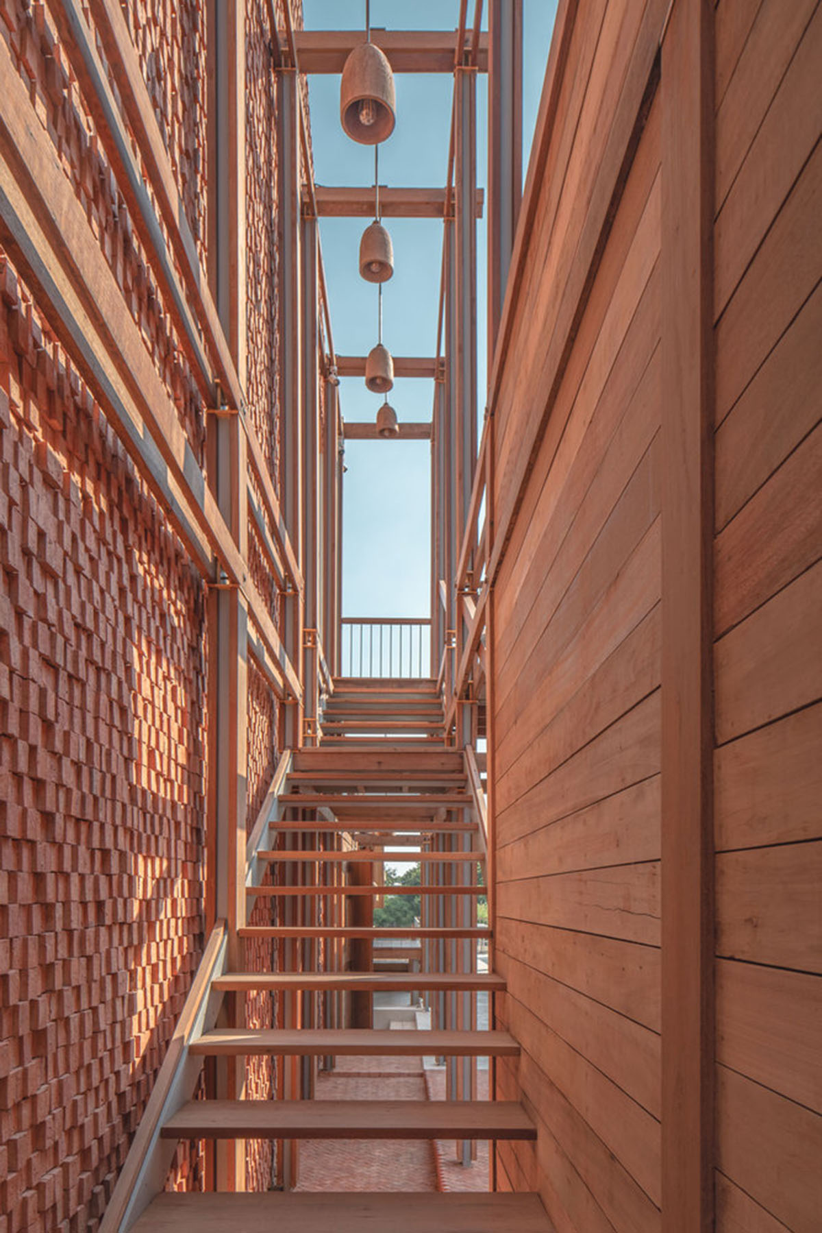 onion designs hotel and restaurant with handmade orange bricks in Thailand