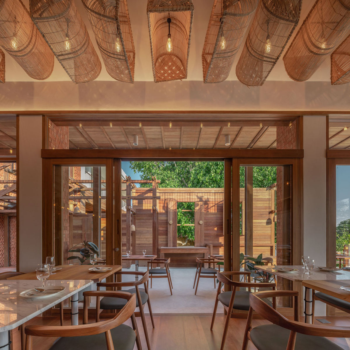 onion designs hotel and restaurant with handmade orange bricks in Thailand