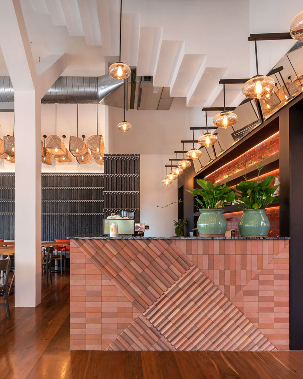 onion designs hotel and restaurant with handmade orange bricks in Thailand