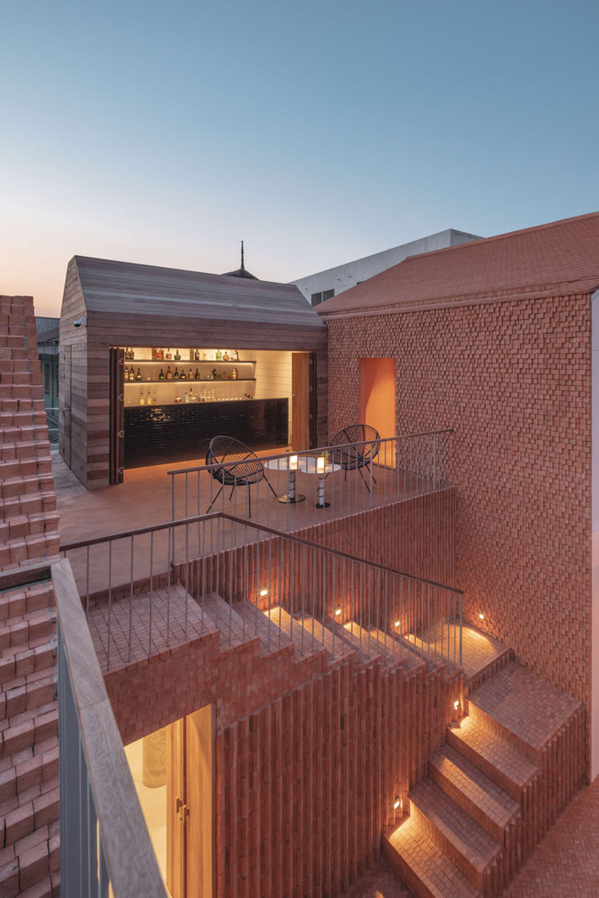 onion designs hotel and restaurant with handmade orange bricks in Thailand