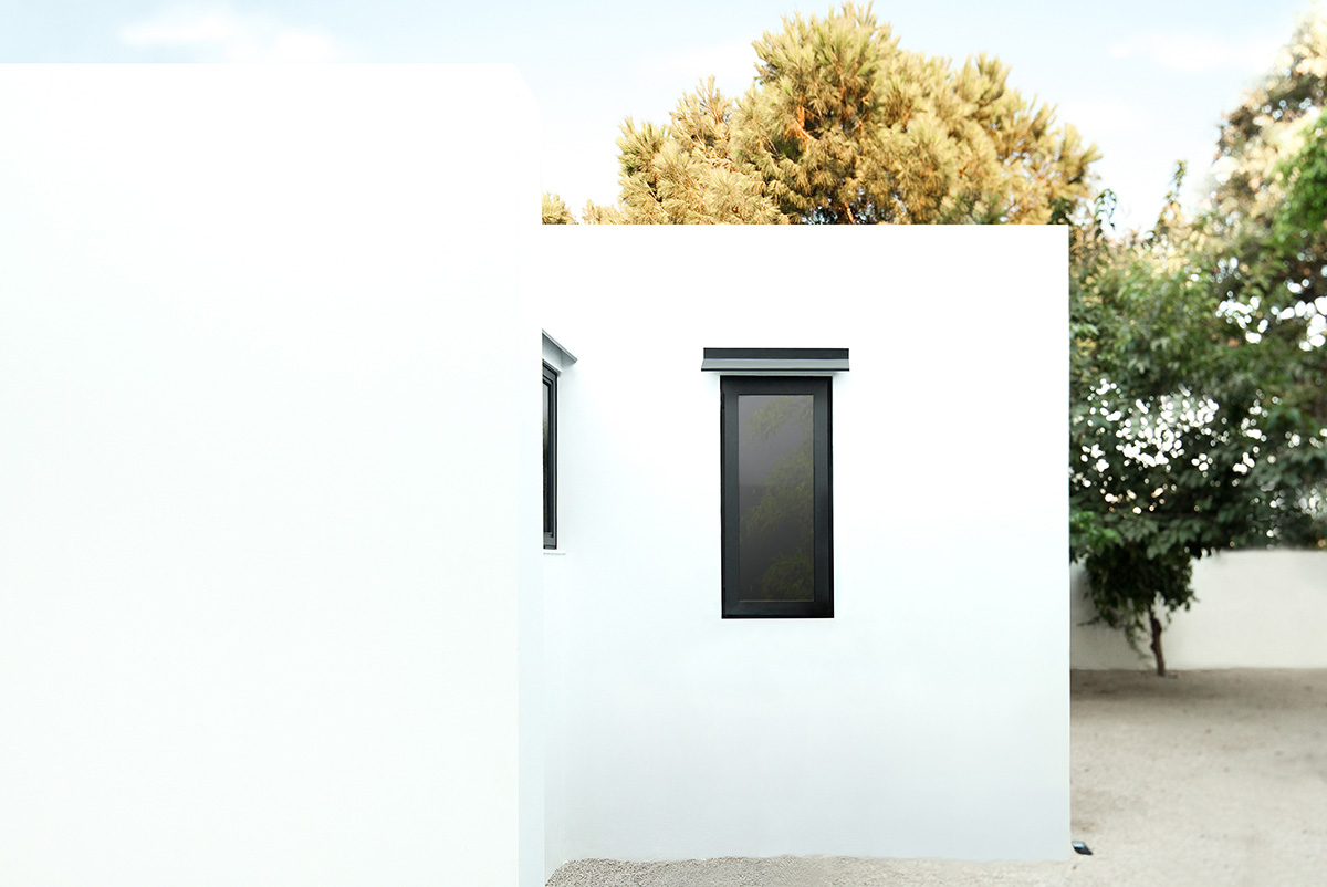 Mandalaki Studio completes minimalist prefabricated holiday house in Greece