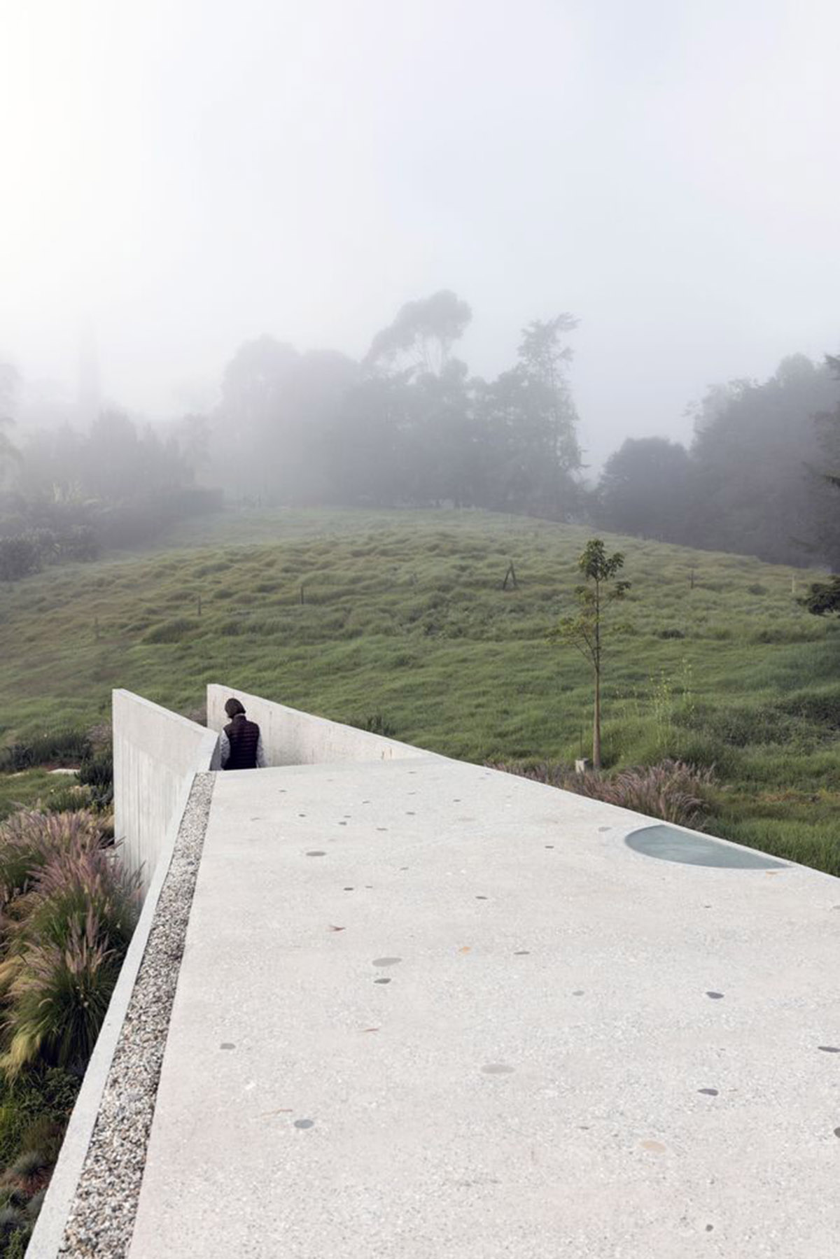 Ballen House in Colombia explores possibilities of living in larger spaces in a lush hilly terrain