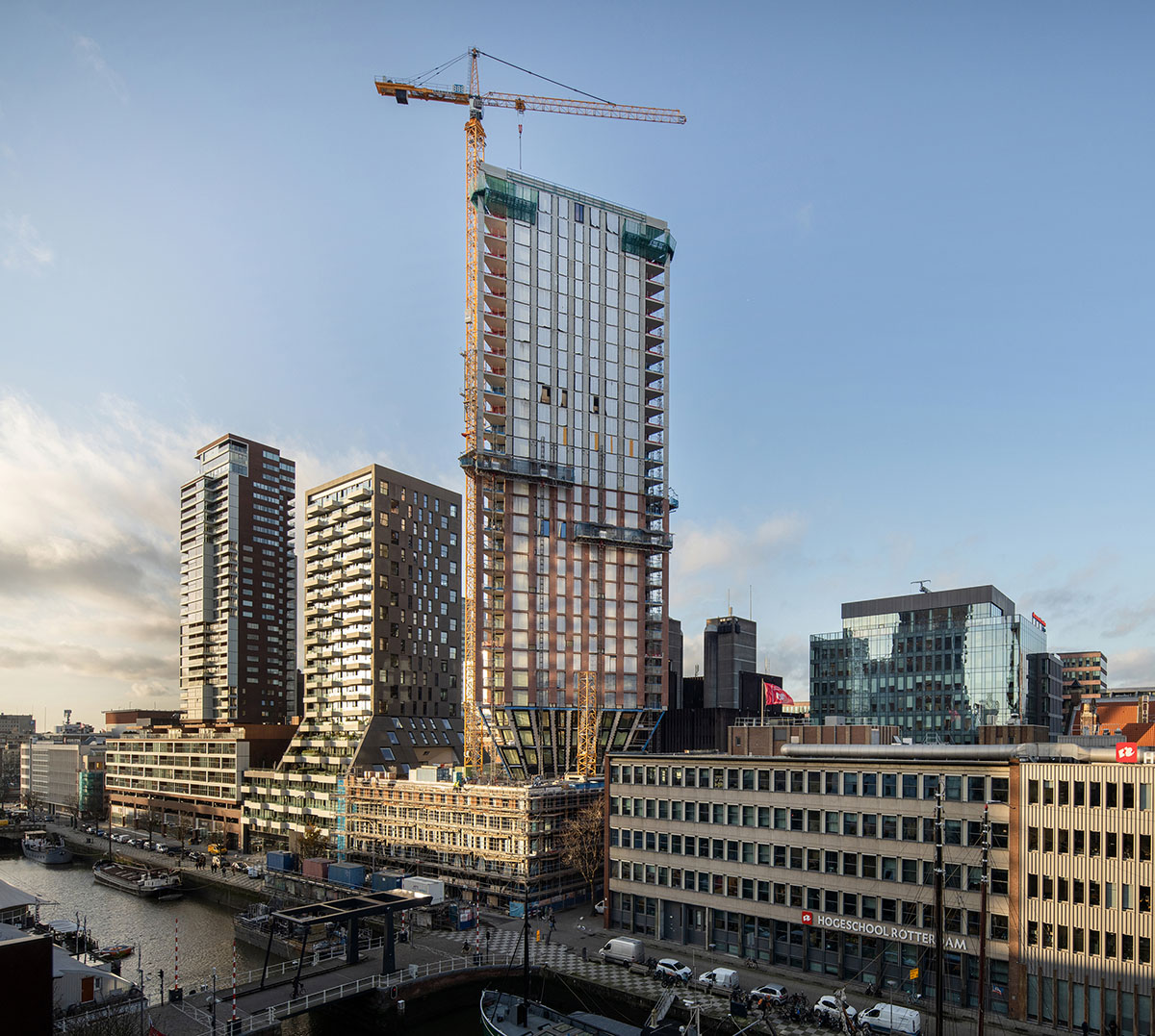 Barcode Architects' CasaNova, set to be Rotterdam's first triangular tower, tops out
