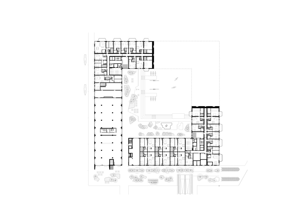 BIG и Barcode Architects построили треугольный жилой блок, консольный угол которого образует ворота. 
