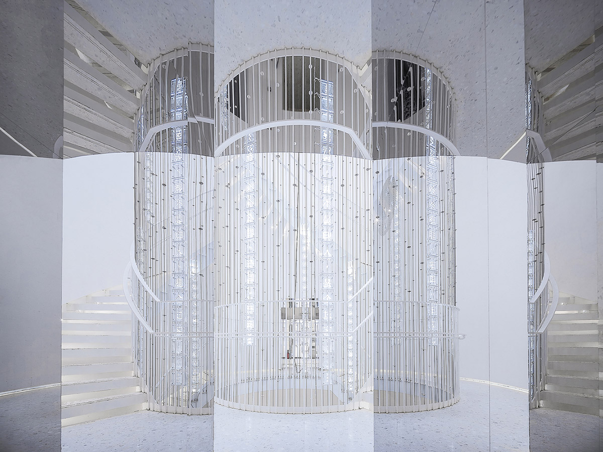 Ten towering cylindrical cement silos are converted to house immersive library of books in China