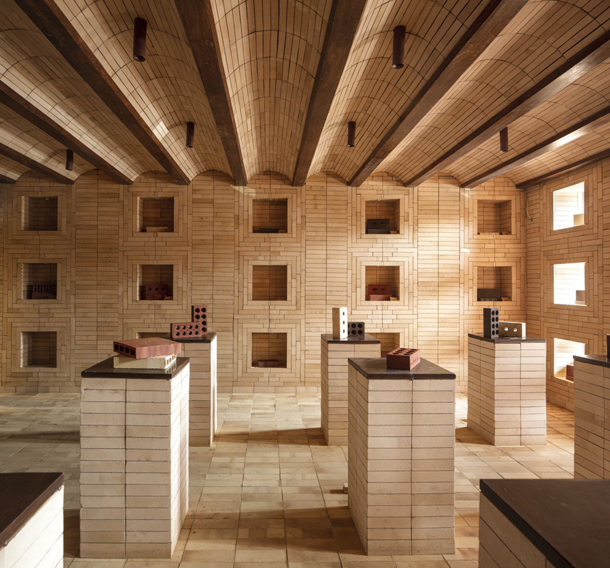 Brick showroom is made of various hues of modular brick celebrating resilient feature of material