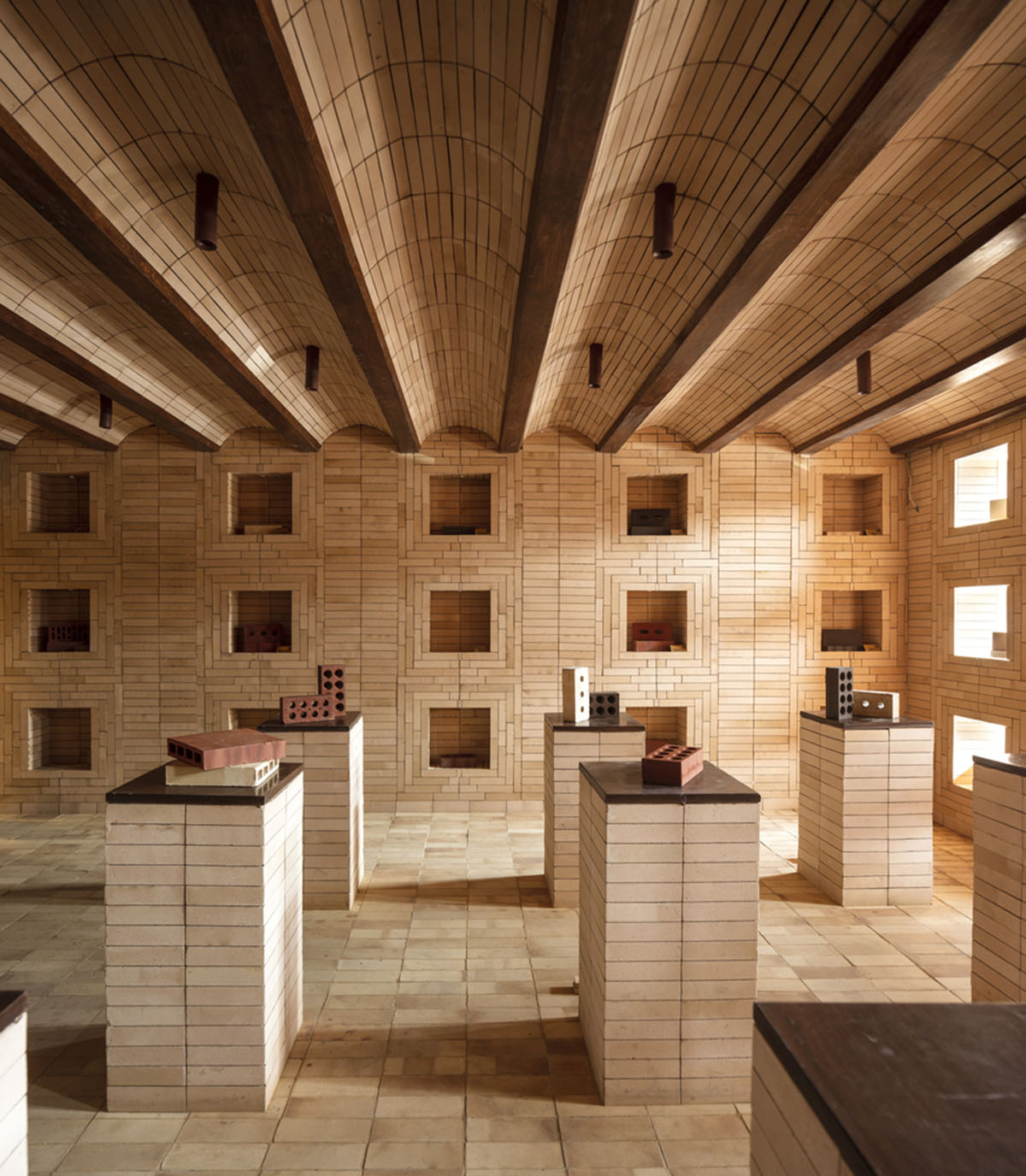 Brick showroom is made of various hues of modular brick celebrating resilient feature of material