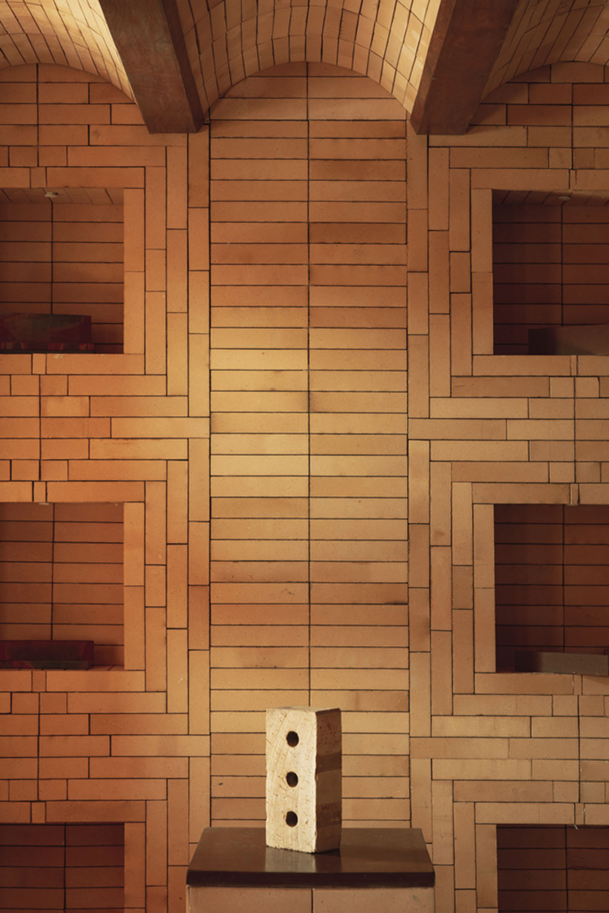 Brick showroom is made of various hues of modular brick celebrating resilient feature of material