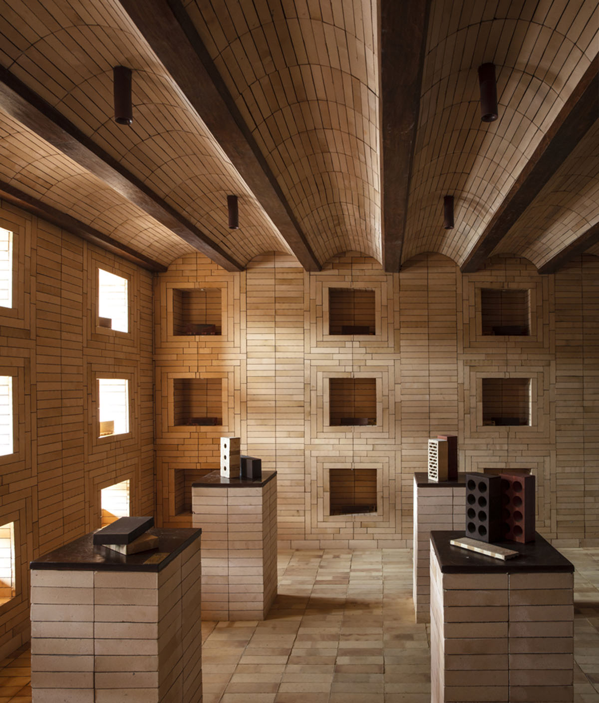 Brick showroom is made of various hues of modular brick celebrating resilient feature of material