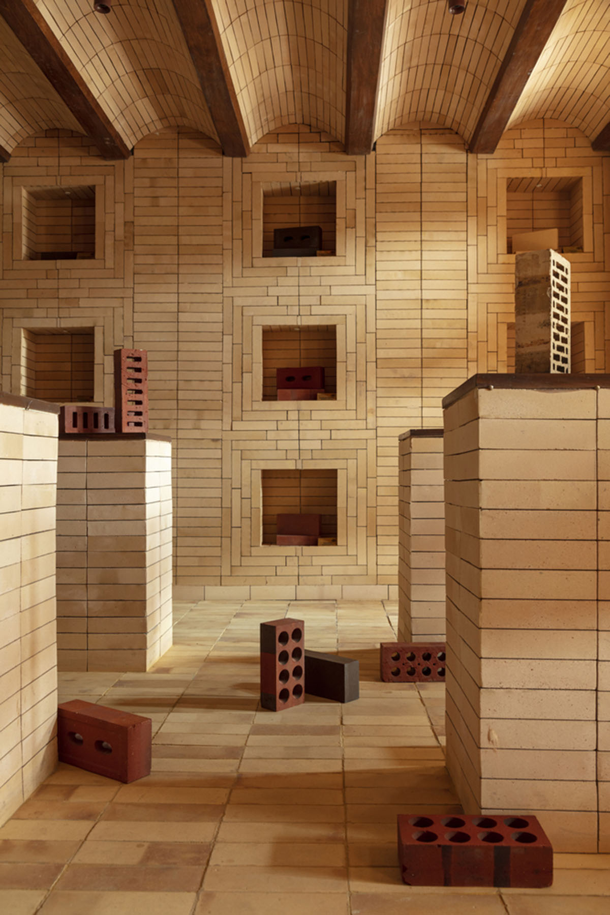 Brick showroom is made of various hues of modular brick celebrating resilient feature of material