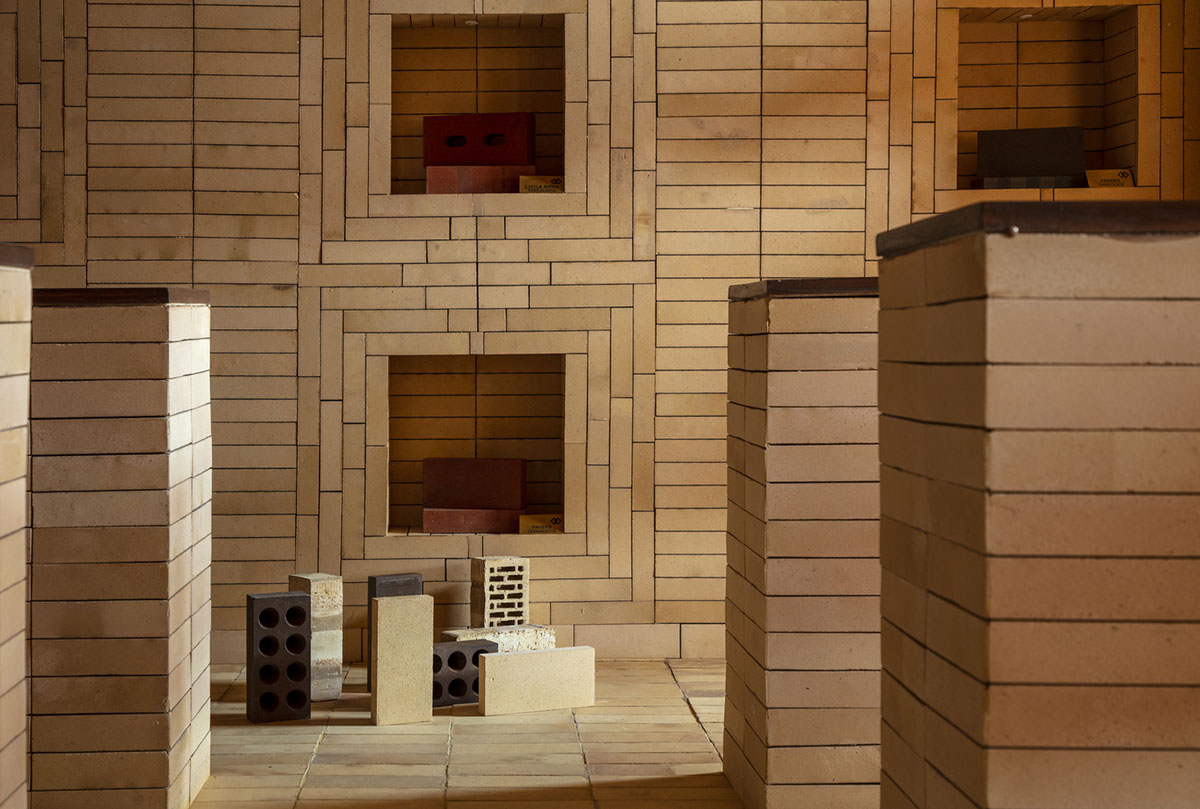Brick showroom is made of various hues of modular brick celebrating resilient feature of material
