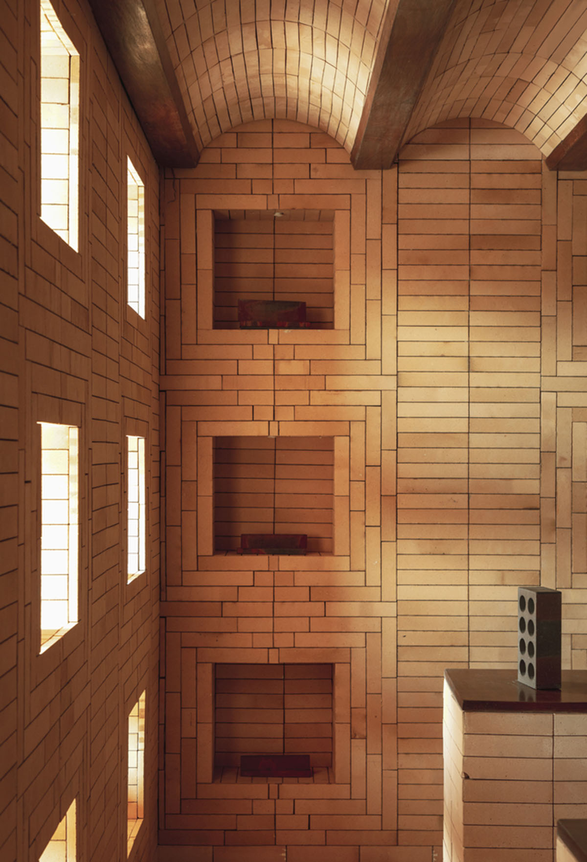Brick showroom is made of various hues of modular brick celebrating resilient feature of material