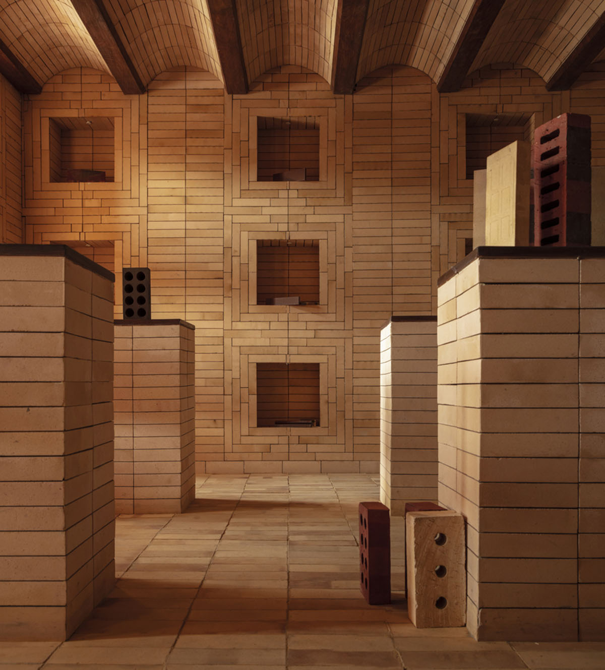 Brick showroom is made of various hues of modular brick celebrating resilient feature of material