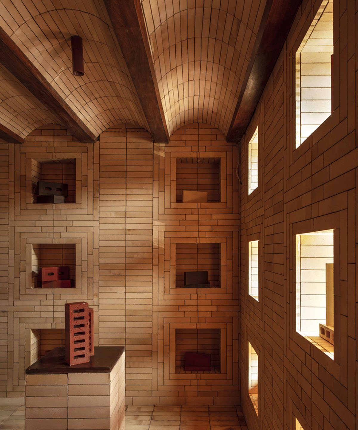 Brick showroom is made of various hues of modular brick celebrating resilient feature of material
