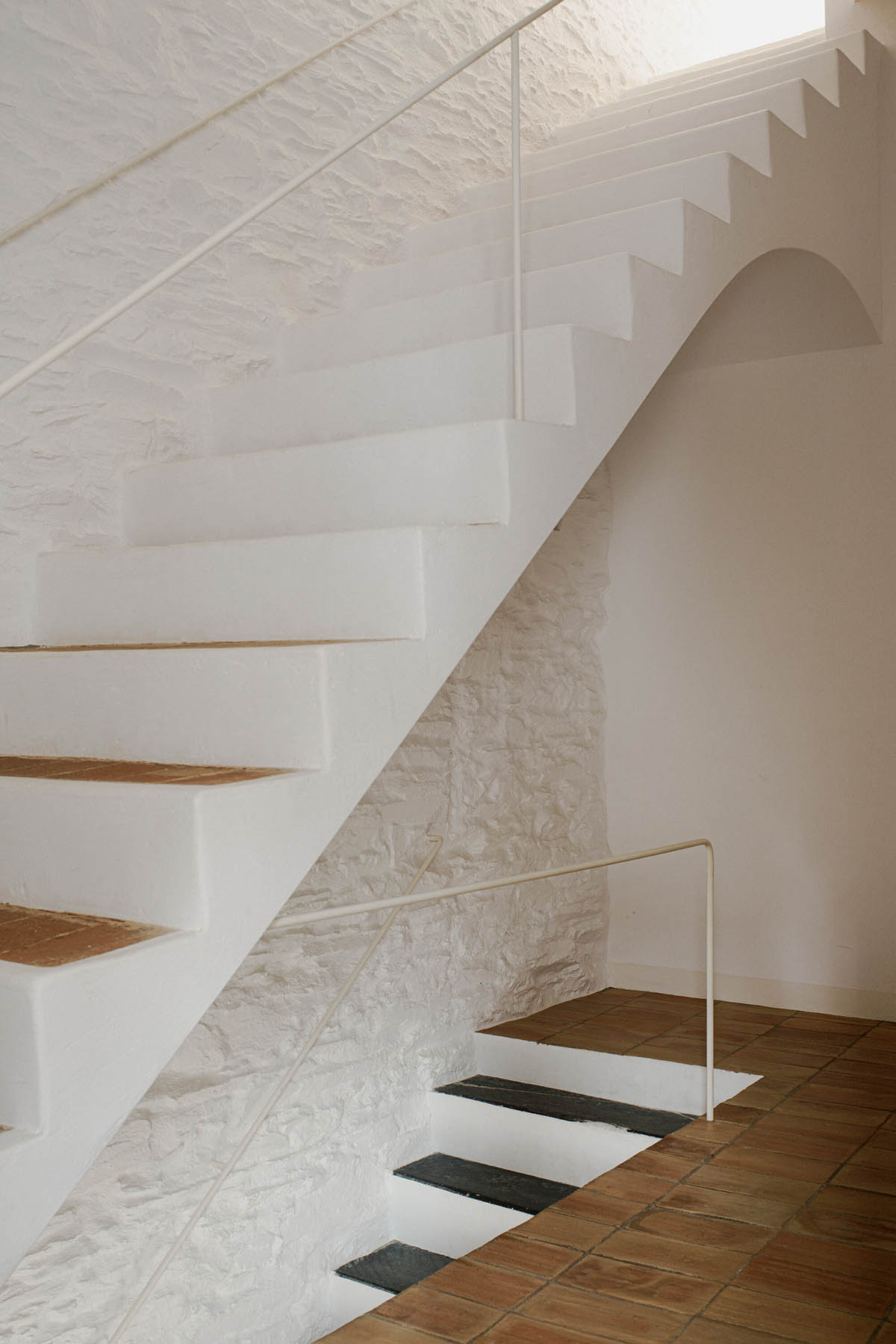 Bea Portabella and Jordi Pagès reimagine residence with a soft fusion of materials in Cadaqués