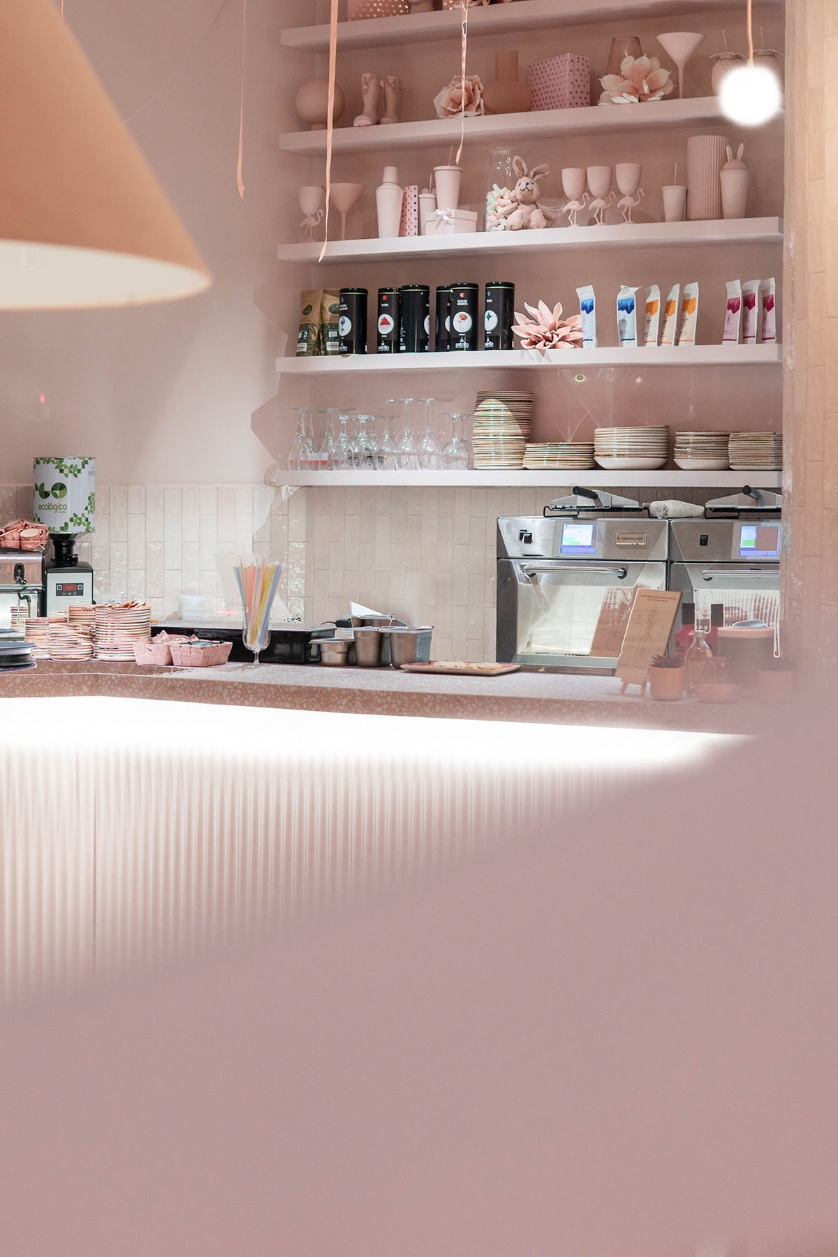 Onlyou Design creates interiors with pinkish geometries and furnitures for Beverly Cafe in Valencia 