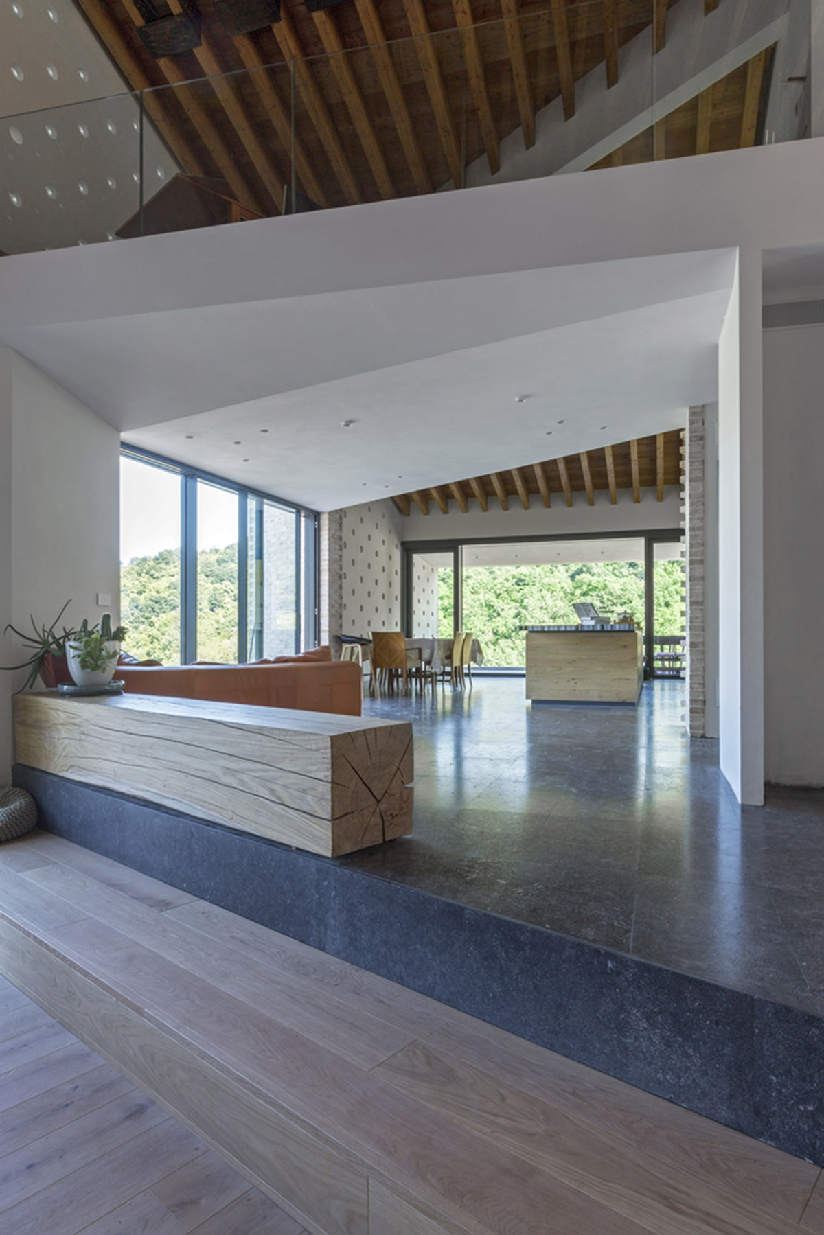 F:L Architetti creates layers of uses in this rural villa and farmhouse on the hills of Italy