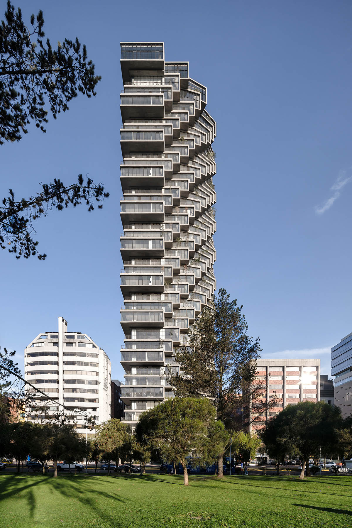 Rotated concrete residences form BIG's new residential tower in Quito 