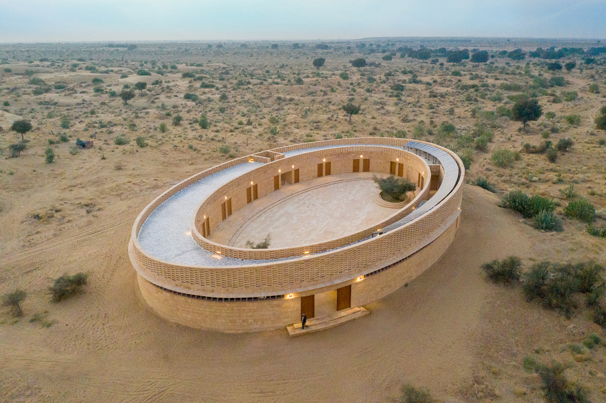 Diana Kellogg Architects' oval-shaped girl's school is made of hand-carved sandstone in rural India
