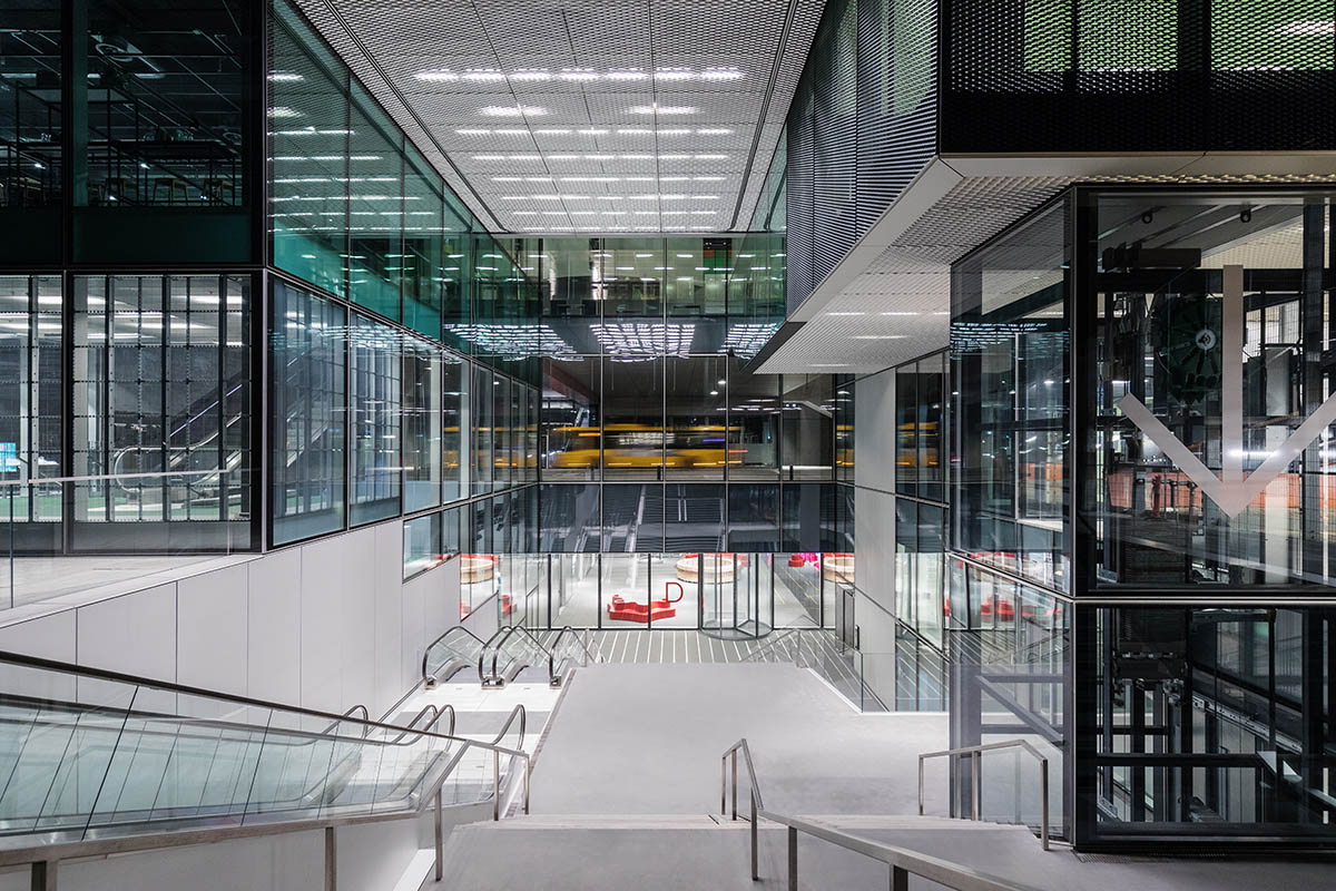 OMA's new cultural hub featuring a stack of green boxes opens in Copenhagen