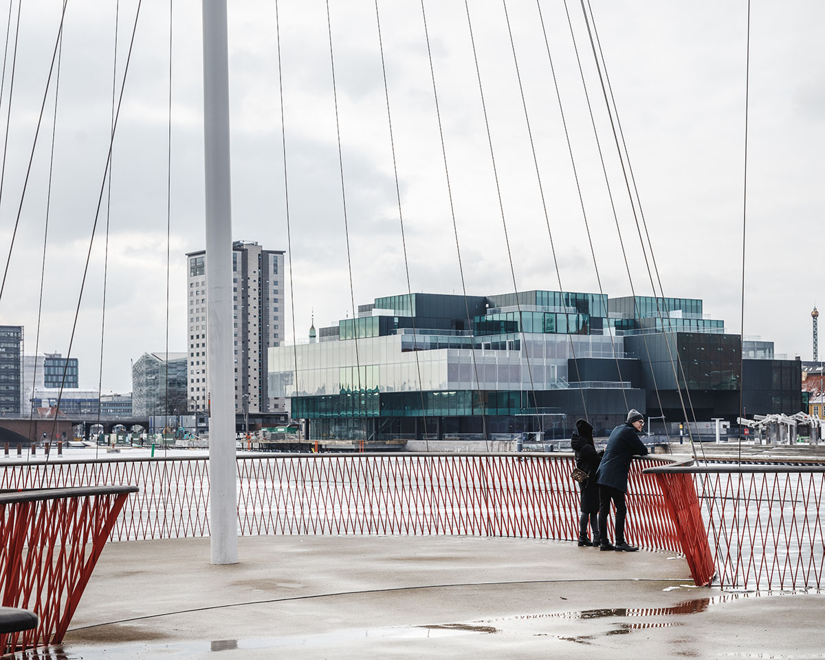 OMA's new cultural hub featuring a stack of green boxes opens in Copenhagen
