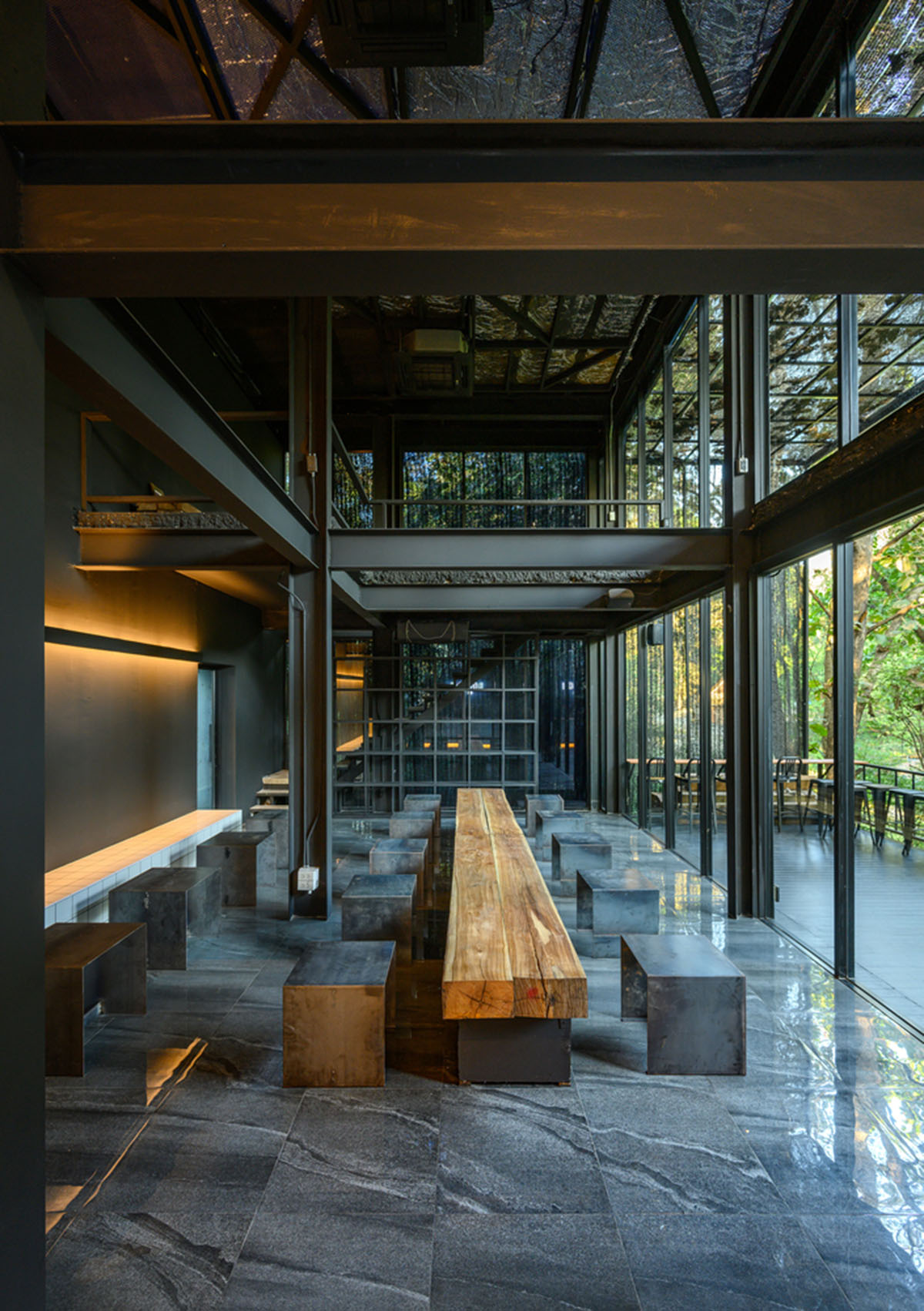 Sher Maker creates cafe from 6-meter opaque curtain wall in a forest in Thailand