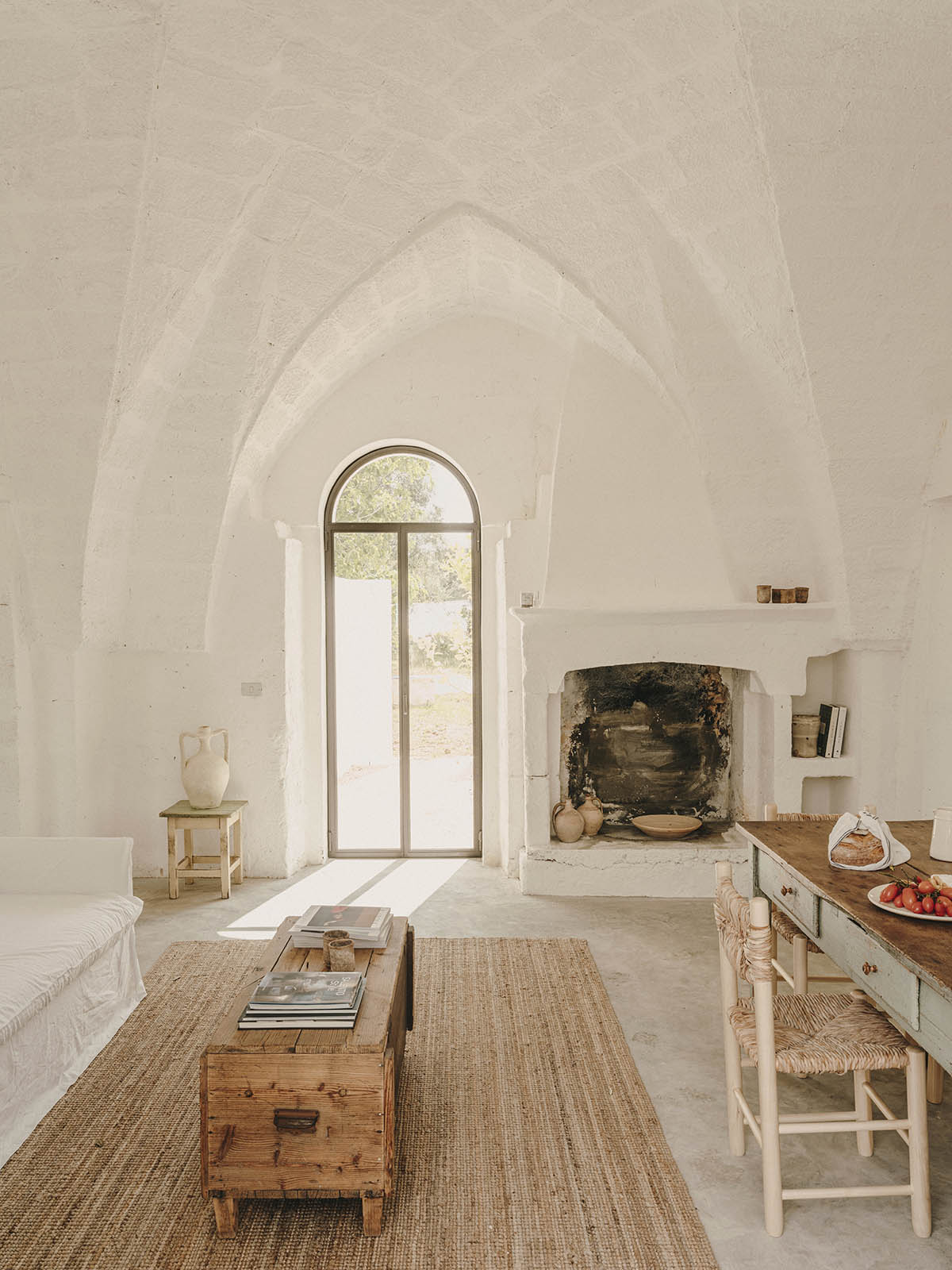 Studio Andrew Trotter converts three white stone country houses into bed and breakfast in Oria