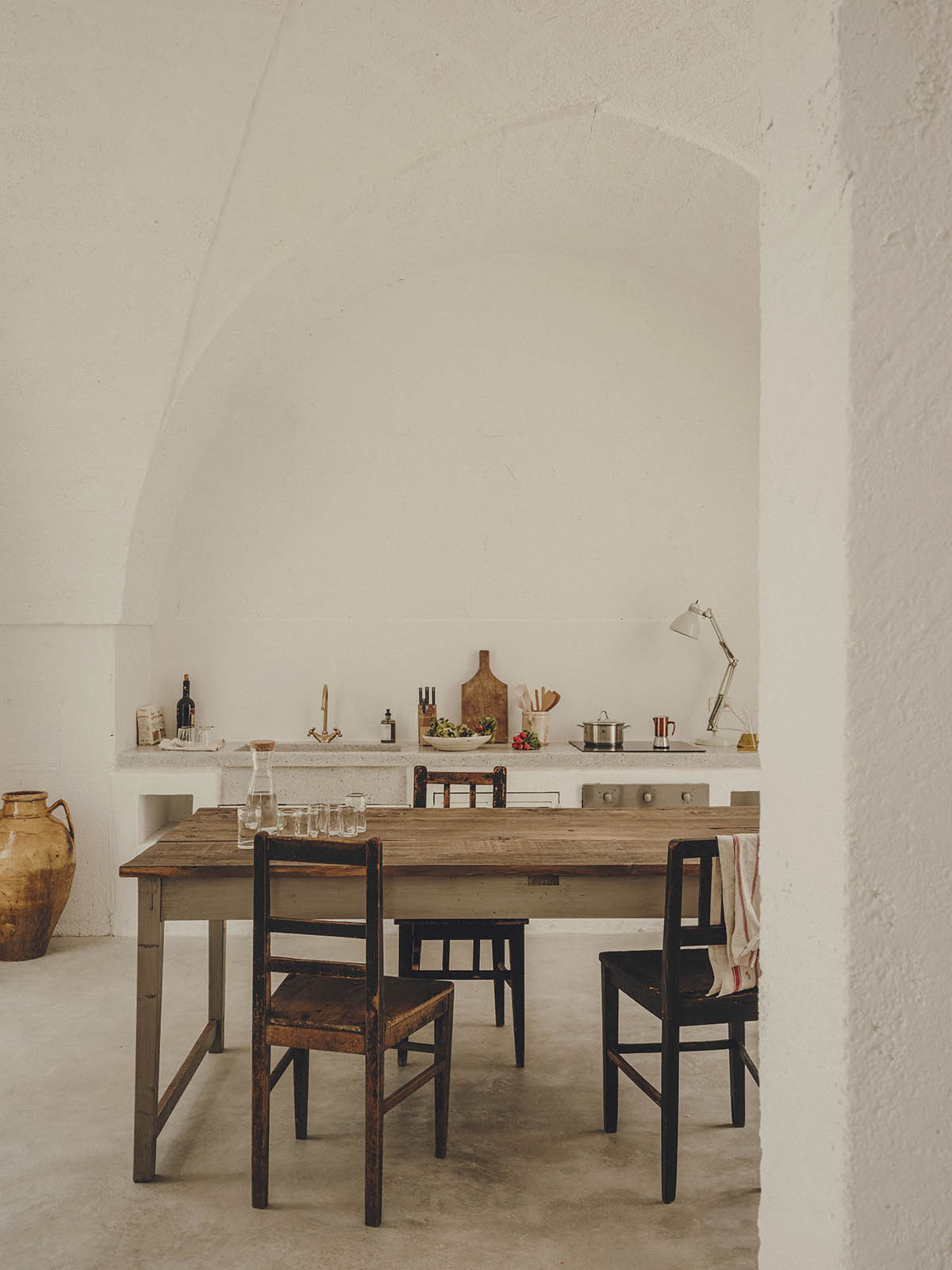 Studio Andrew Trotter converts three white stone country houses into bed and breakfast in Oria