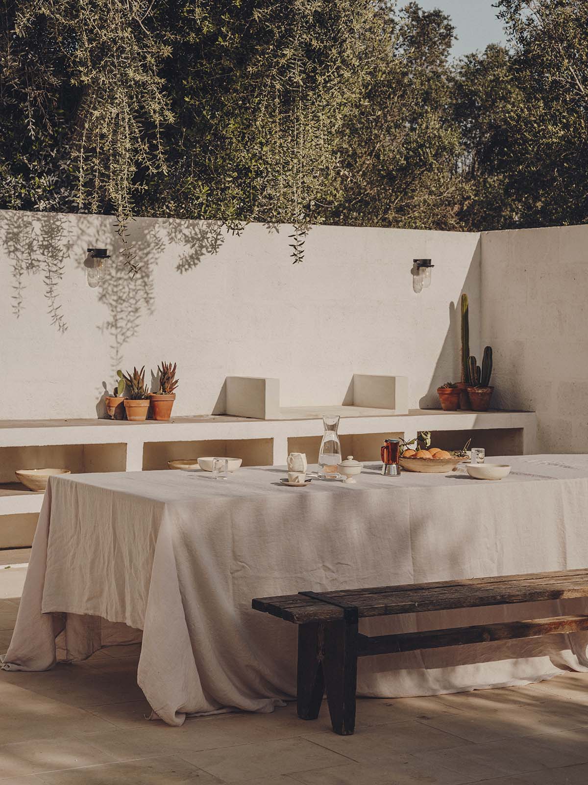 Studio Andrew Trotter converts three white stone country houses into bed and breakfast in Oria
