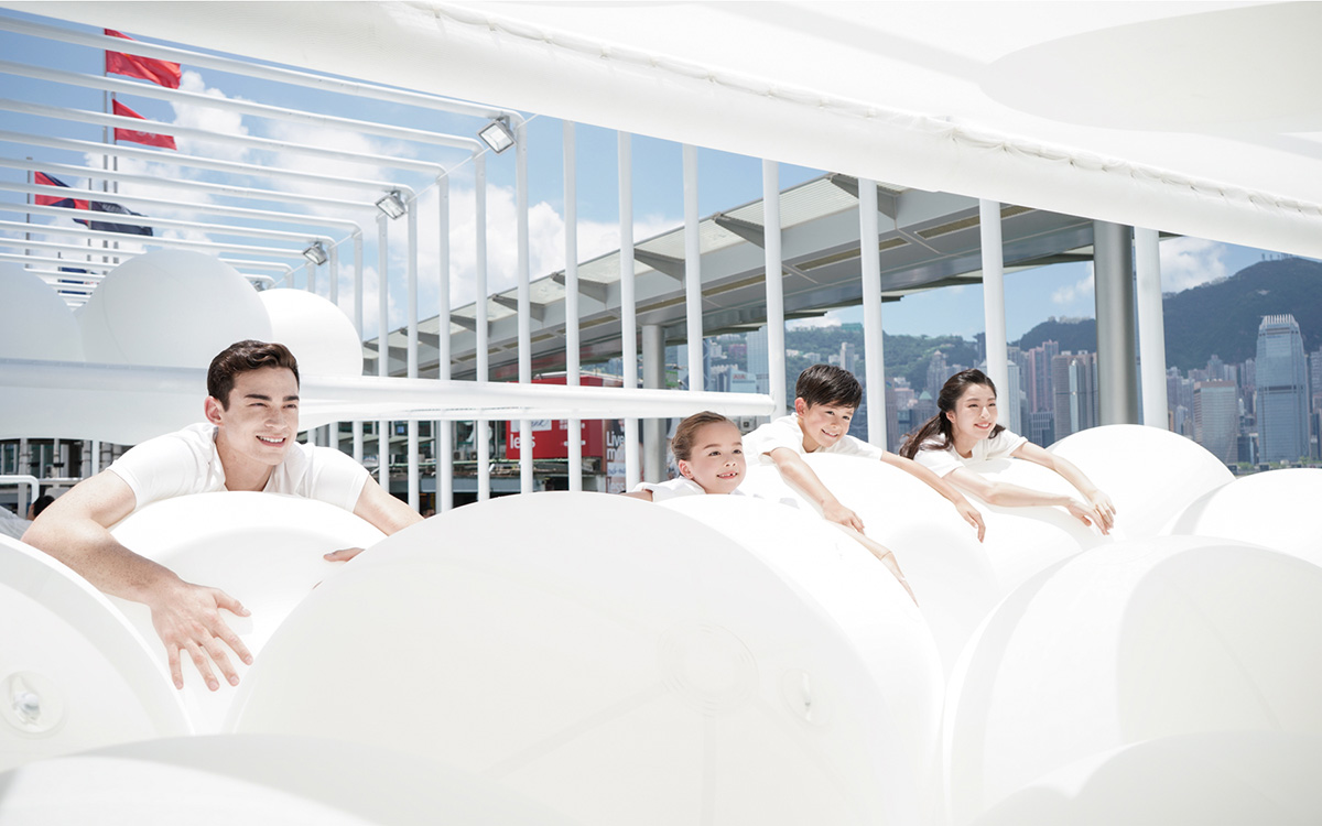 Snarkitecture fills giant steel cage with white bouncy balls at Harbour City of Hong Kong