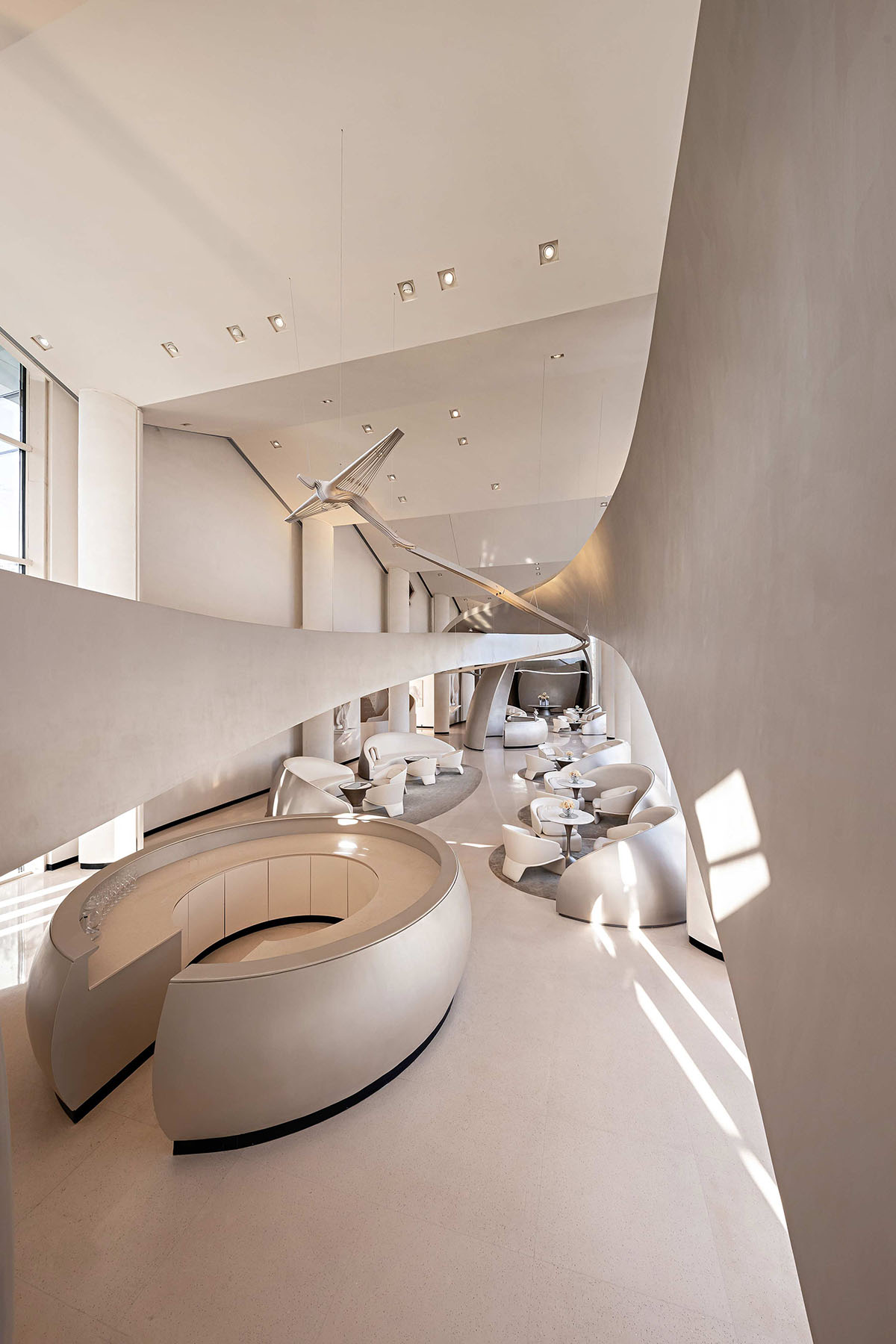 GBD Design creates interiors for clubhouse with fluid forms and dynamic sculptures in China