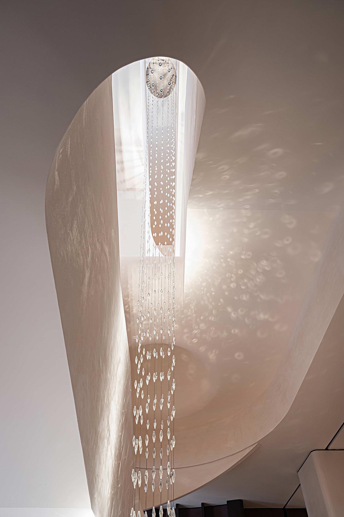 GBD Design creates interiors for clubhouse with fluid forms and dynamic sculptures in China