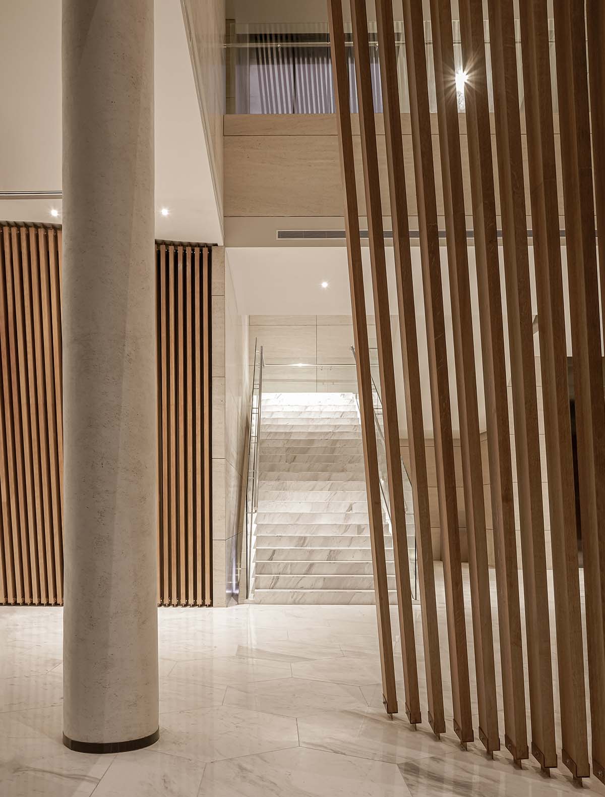 The interior of the Kuwait Embassy creates an inviting and warm atmosphere, designed by Architectkidd