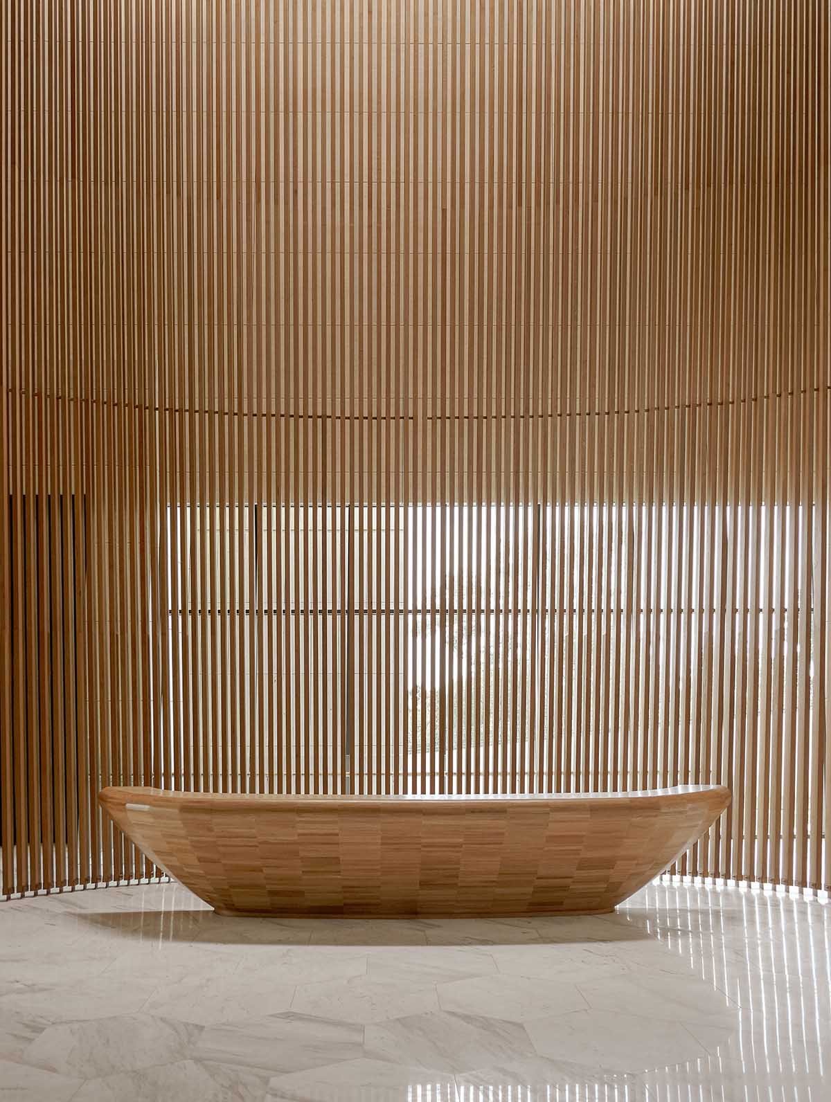 The interior of the Kuwait Embassy creates an inviting and warm atmosphere, designed by Architectkidd