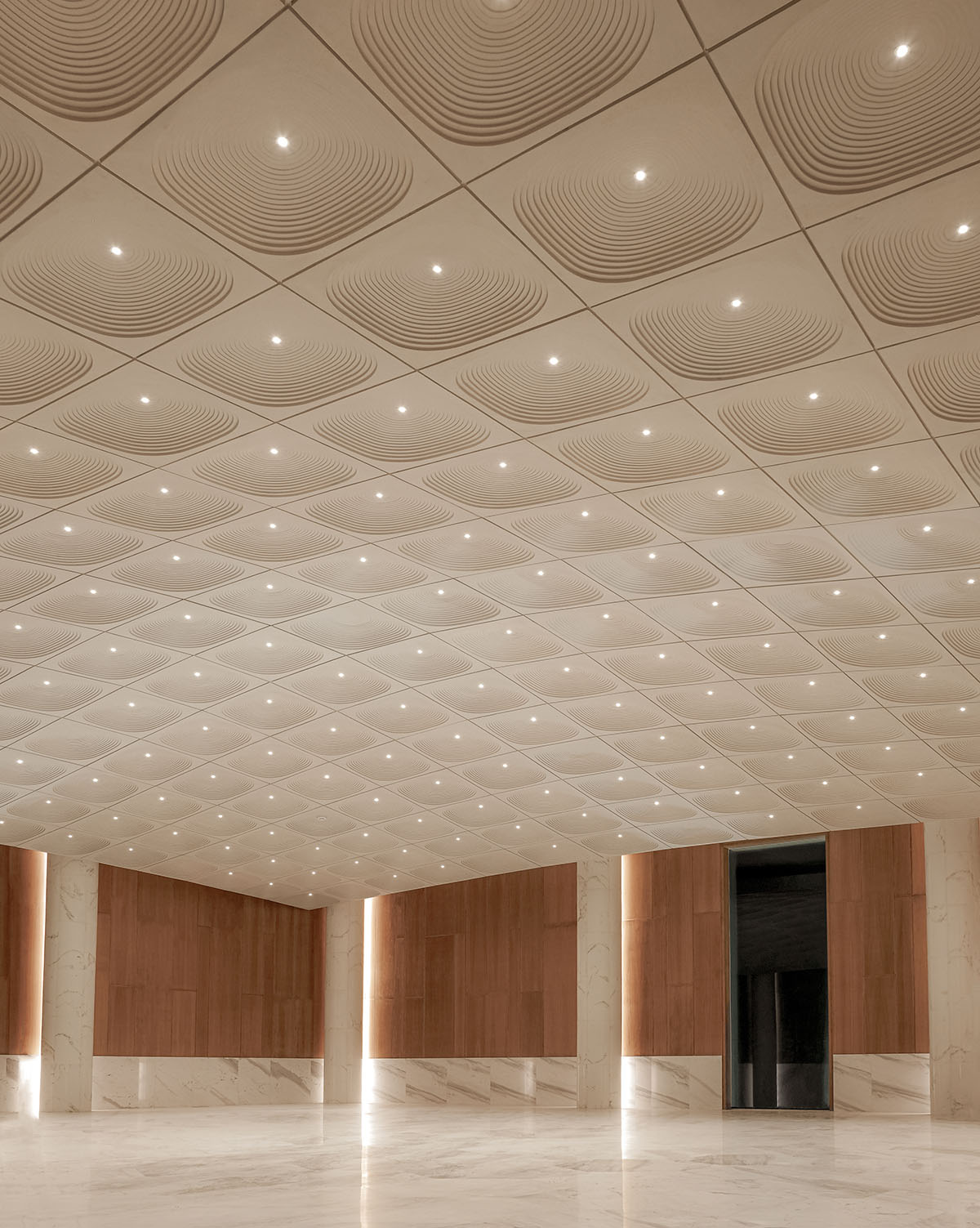 The interior of the Kuwait Embassy creates an inviting and warm atmosphere, designed by Architectkidd