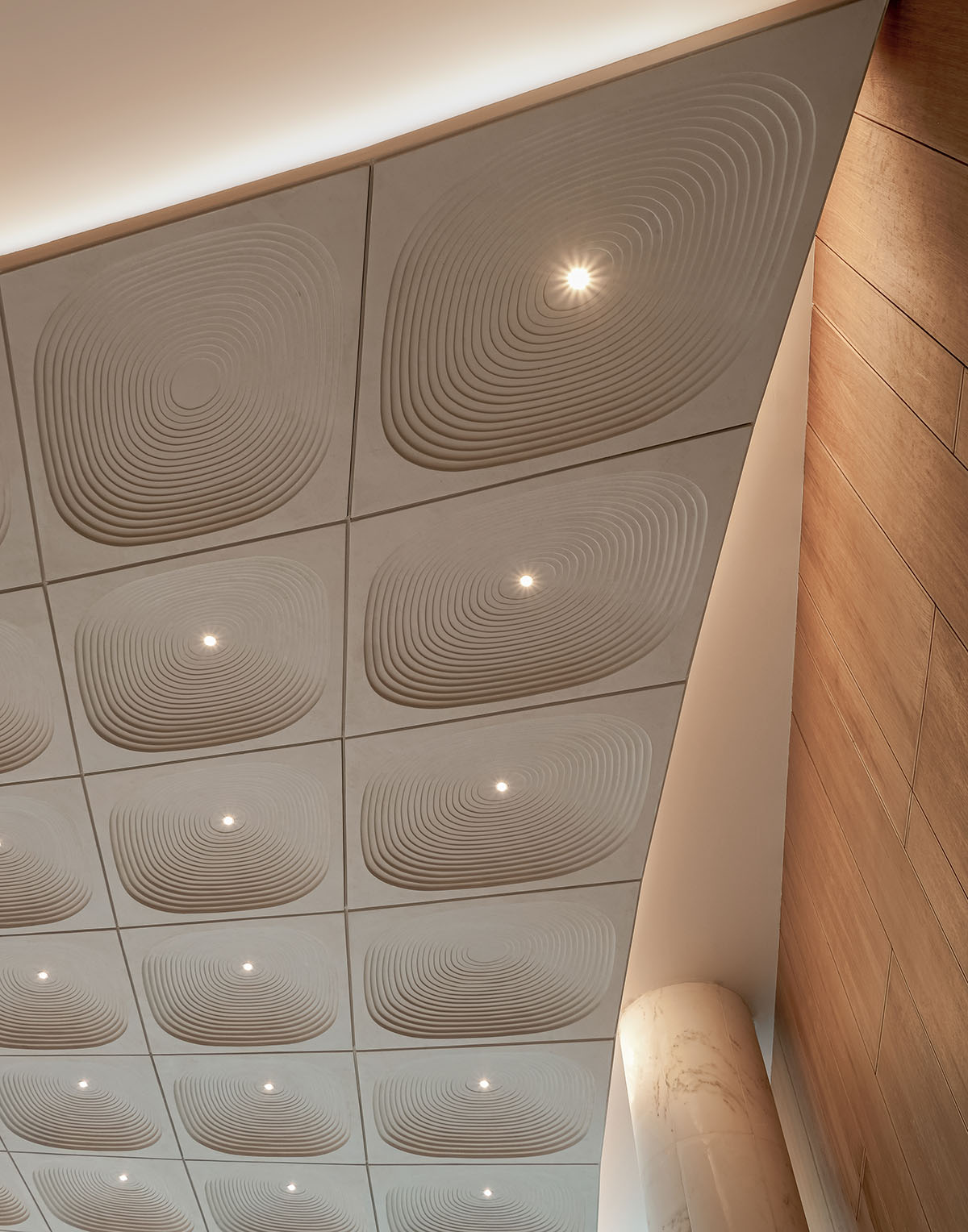 The interior of the Kuwait Embassy creates an inviting and warm atmosphere, designed by Architectkidd