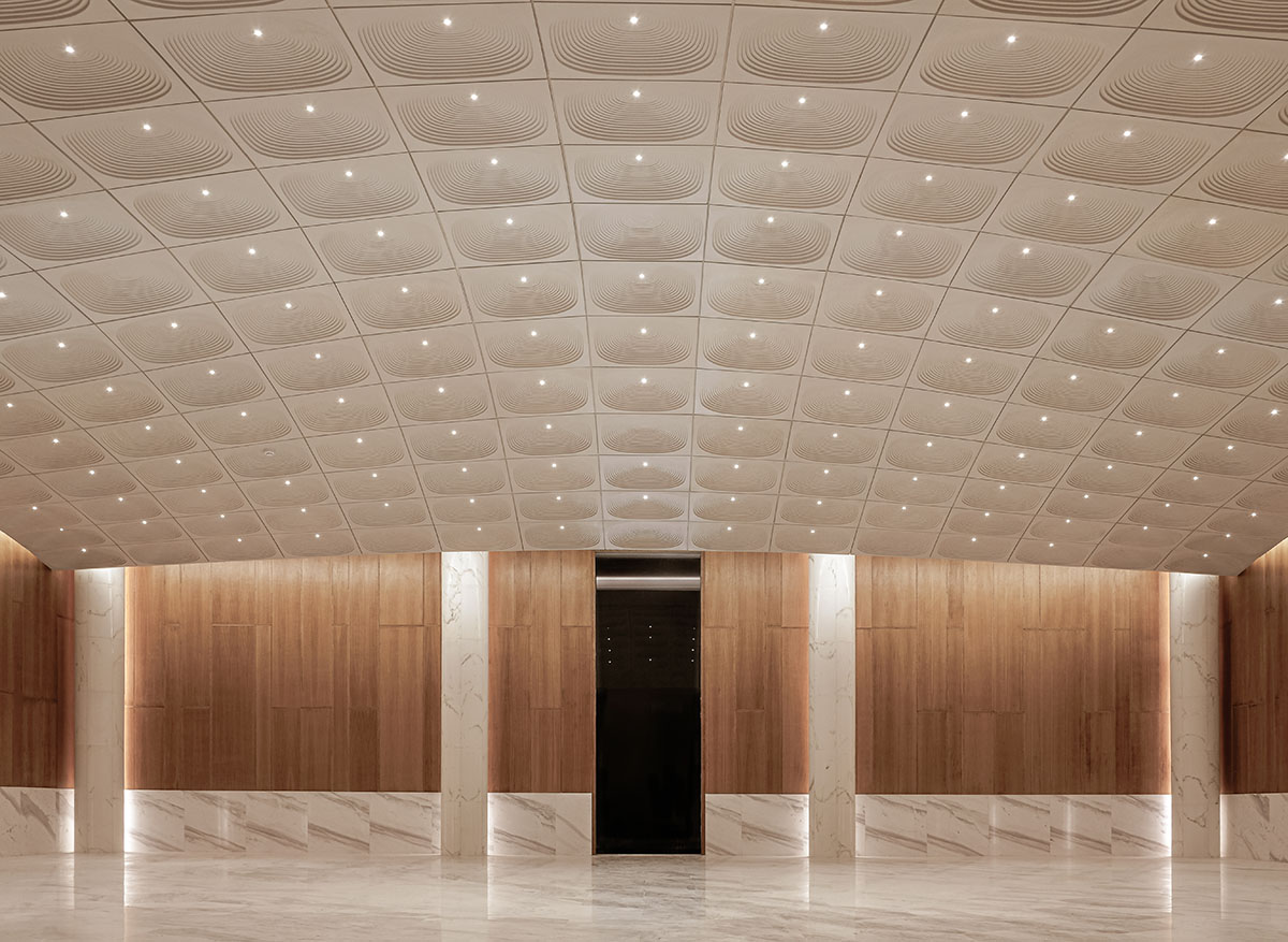 The interior of the Kuwait Embassy creates an inviting and warm atmosphere, designed by Architectkidd