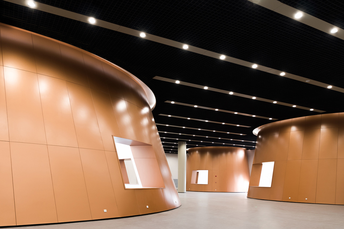 Bernard Tschumi's Exploratorium features copper-clad cones addressing Tianjin's industrial past