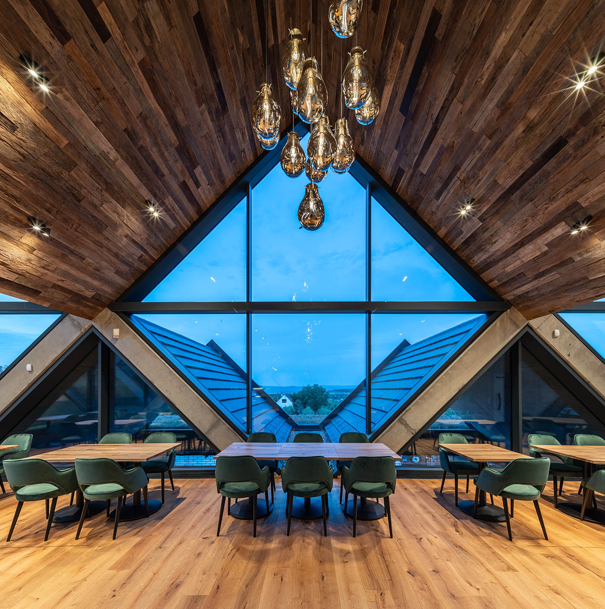 BORD completes cider production facility with rhombus-shaped tunnel-like volumes in Hungary